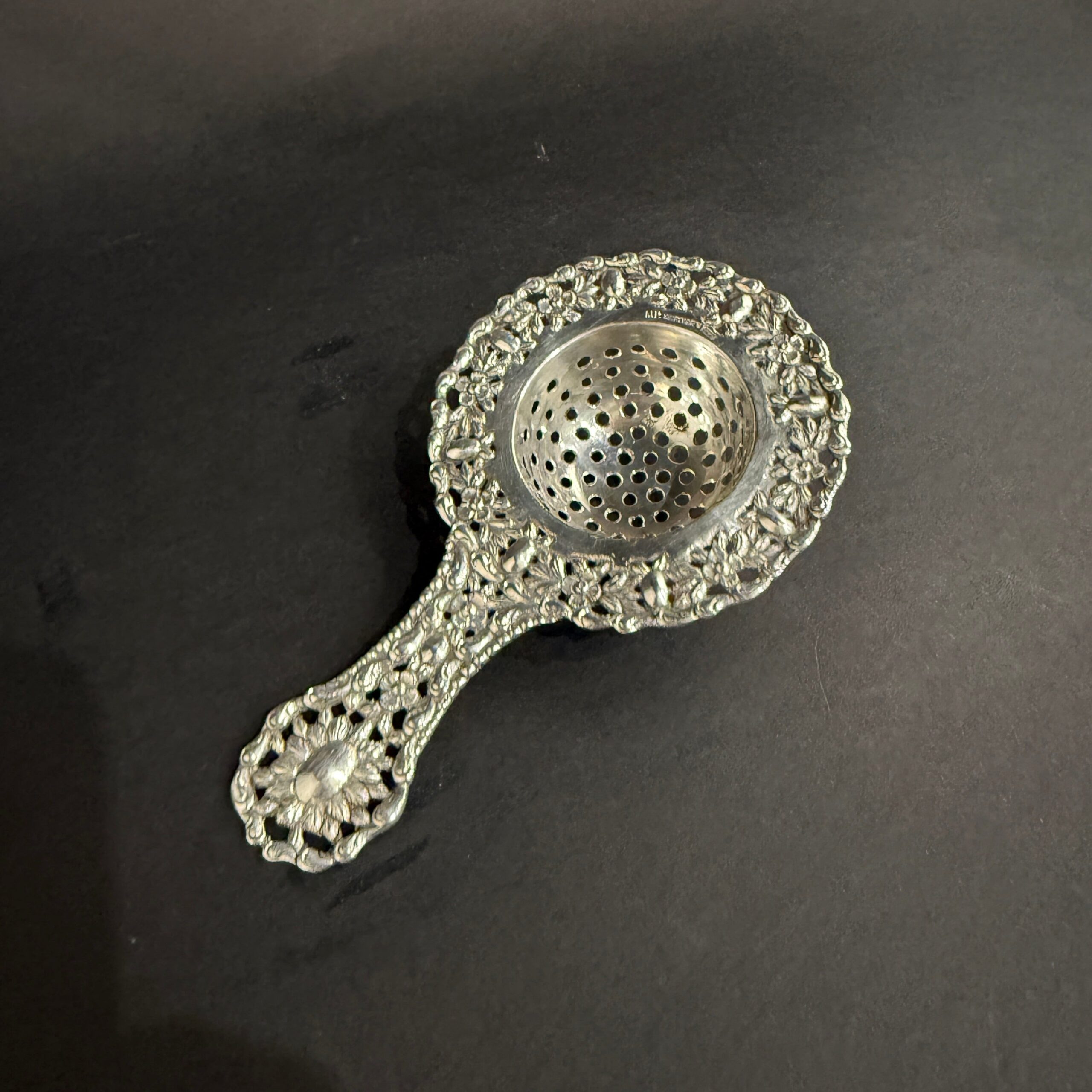 Silver tea strainer, Holland circa 1880