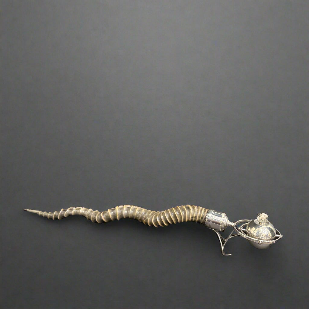 Silver rimmed Indian buck horn gimbal lighter