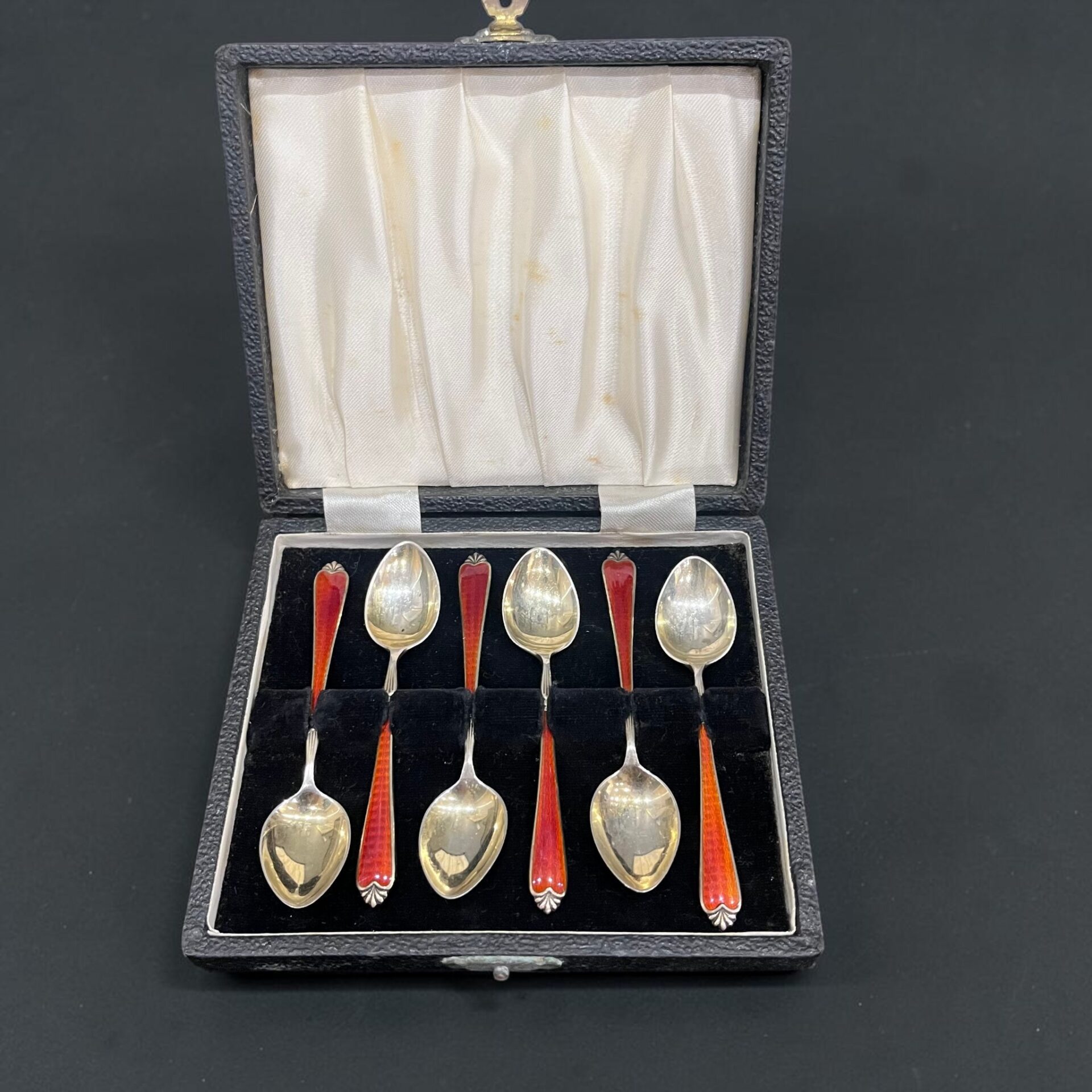 Six enamelled silver coffee spoons, Birmingham 1952 by Adie Brothers Ltd