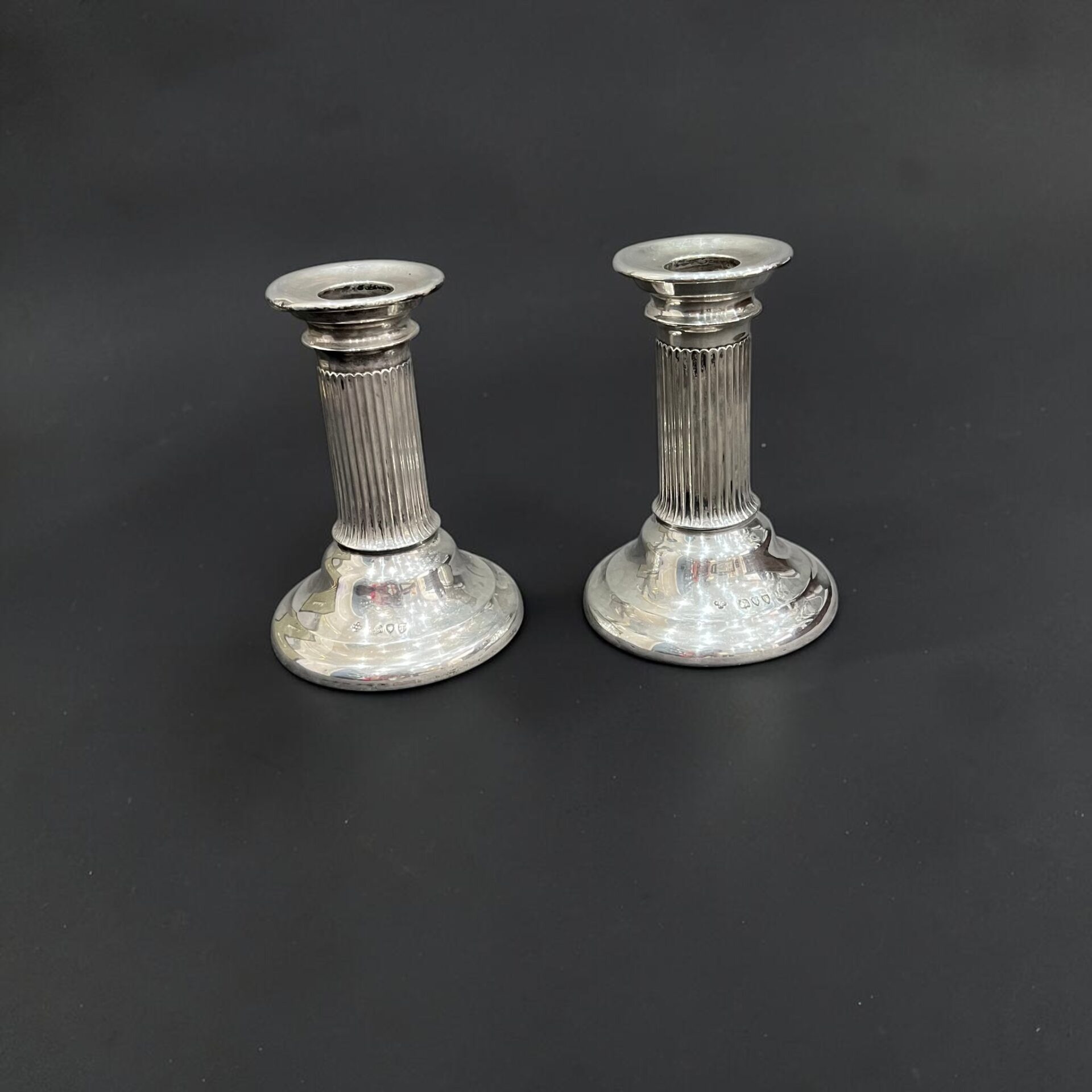Pair of silver dwarf candlesticks, London 1894 by Horace Woodward & Co Ltd