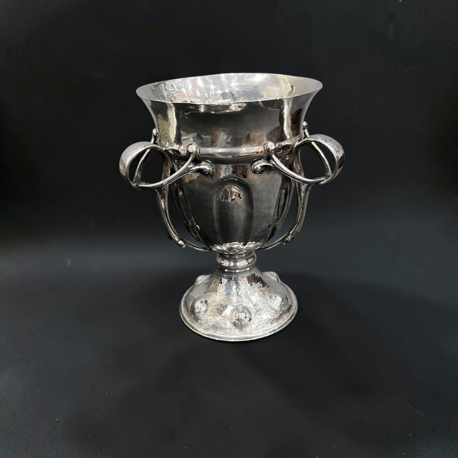 Arts & Crafts silver mug with three handles, London in 1907 by Jackson and Fullerton