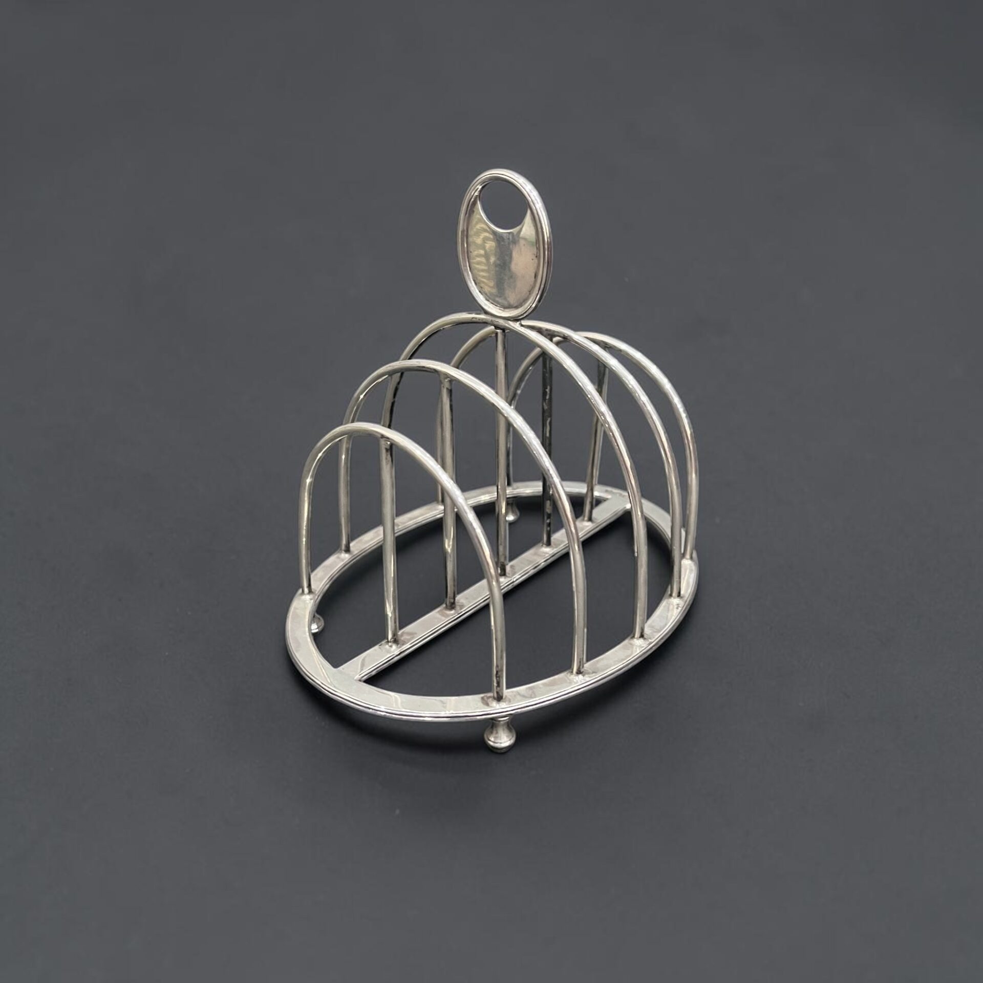 Silver toast rack, Sheffield 1951 by Harrison Bros